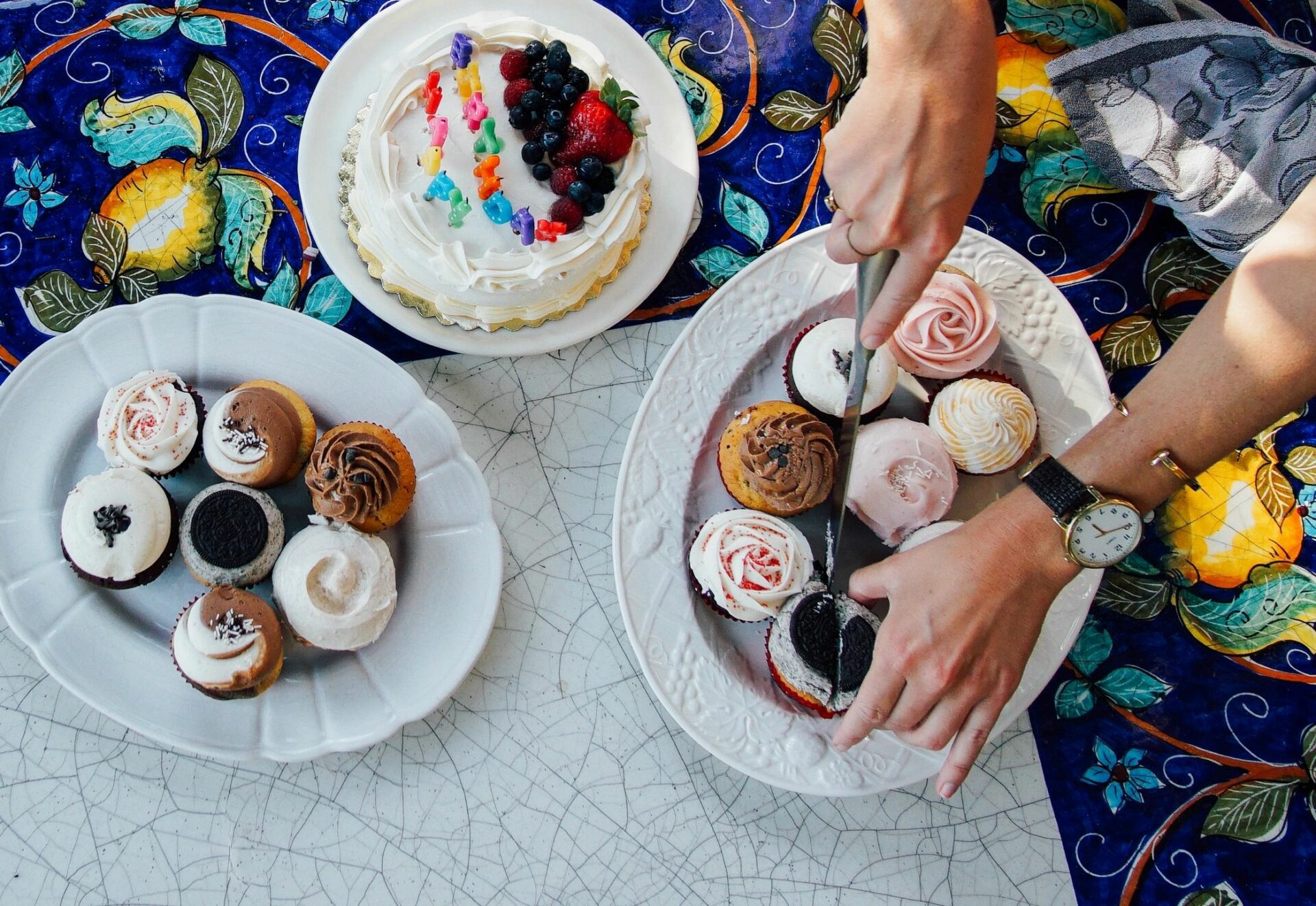 cupcakes and cakes on plates