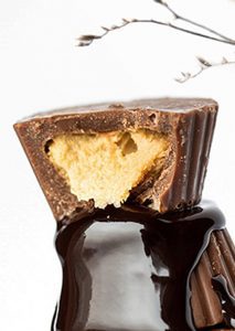A close up of a chocolate covered candy bar