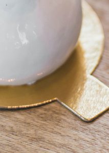 A close up of the corner of a plate
