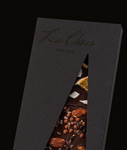 A black box with some different types of chocolate