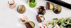 A variety of desserts are on display.