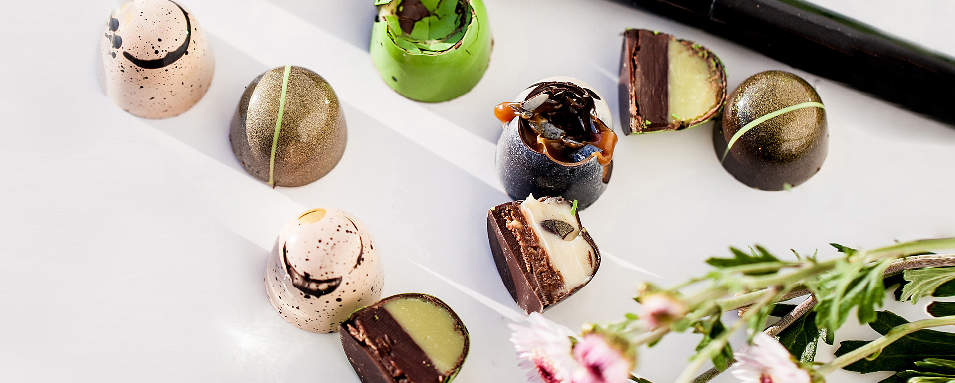 A variety of desserts are on display.