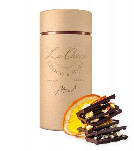 A tall cardboard tube with chocolate and orange slices.