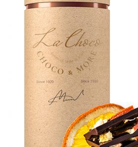 A bottle of chocolate and some orange slices