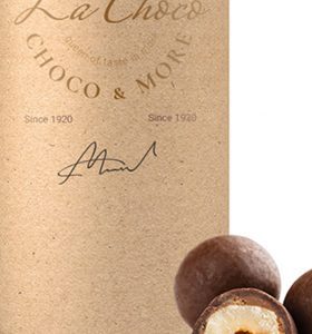 A bottle of chocolate and some truffles