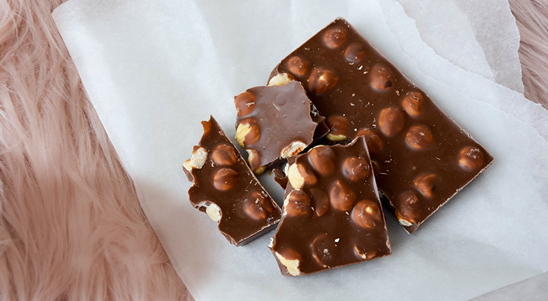 A close up of some chocolate with nuts
