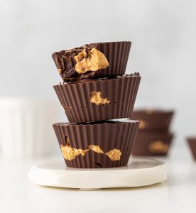Three chocolate cups stacked on top of each other.