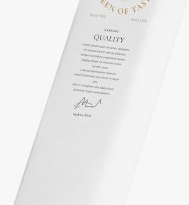 A white paper with the word quality written on it.