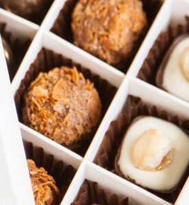 A close up of several different types of chocolates