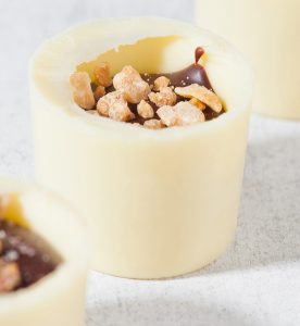 A close up of some cups with food inside