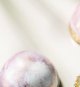 A close up of some pink and white eggs