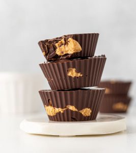 Three chocolate cups stacked on top of each other.
