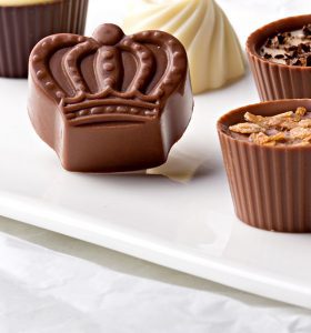 A close up of chocolate candies on a table