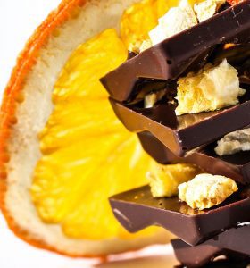 A close up of chocolate and an orange