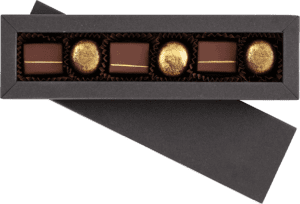 Assorted gourmet chocolates in a decorative box.