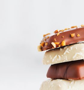 A stack of three different types of cookies.