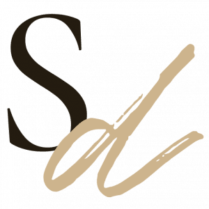 A black and brown logo with the letter s