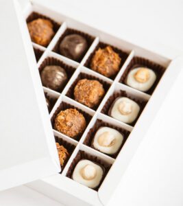 Box of assorted gourmet chocolates.