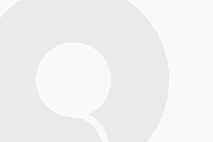 A white background with a black circle in the middle
