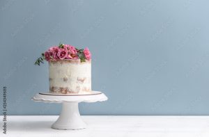 A cake with flowers on top of it.