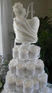 A cake that is made to look like a bride.