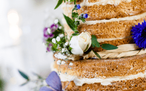 A close up of the cake with flowers on it