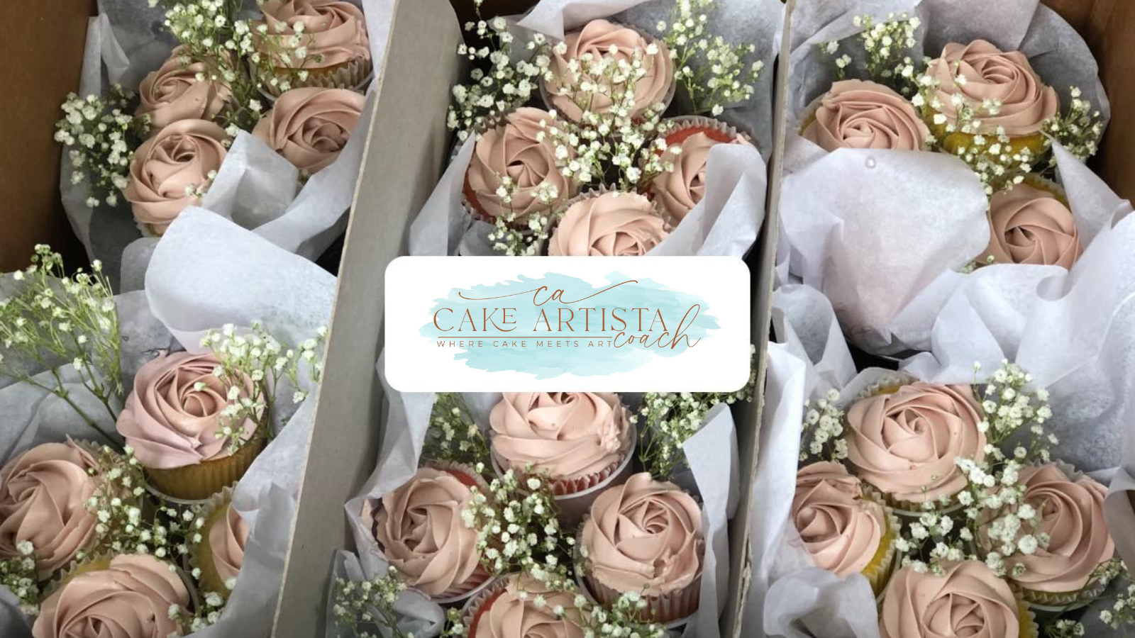 A box of cupcakes with flowers in them