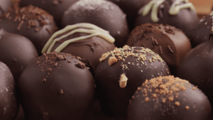 A close up of chocolate covered balls
