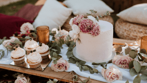 A white cake with flowers on top of it.