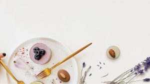 A plate with some food on it and a fork